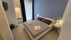 Postel nebo postele na pokoji v ubytování Marieclaire B&B