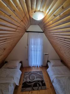 Ένα ή περισσότερα κρεβάτια σε δωμάτιο στο Bungalow in Mountain 2