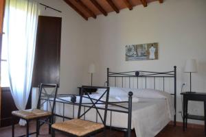 Postel nebo postele na pokoji v ubytování Ferienwohnung für 6 Personen ca 80 qm in Casalappi, Toskana Etruskische Küste