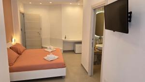 TV a/nebo společenská místnost v ubytování Marieclaire B&B