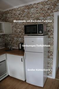 Kuchyň nebo kuchyňský kout v ubytování Ferienwohnung Katharina II
