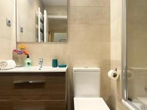 Kylpyhuone majoituspaikassa Apartment 3 bedrooms Camp Nou