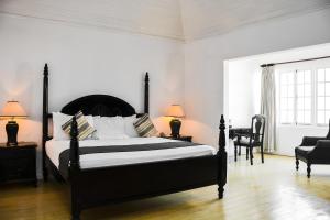 Katil atau katil-katil dalam bilik di Grand Hotel Excelsior Port Royal