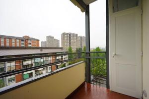 an empty balcony with a view of a city at fiordaliso 1 in Milan