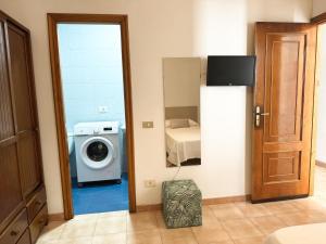 TV a/nebo společenská místnost v ubytování Apartamento LB, vistas a la ría