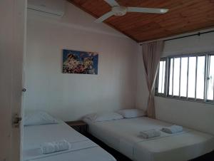 Letto o letti in una camera di Ortimar
