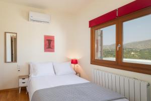 Llit o llits en una habitació de Mount View Villas