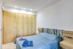 Postel nebo postele na pokoji v ubytování Apartament amb piscina i zona enjardinada + 41 fotografií