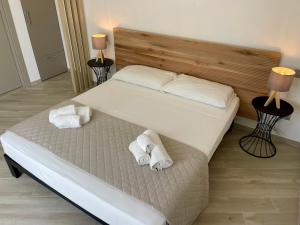 Кровать или кровати в номере Daedalium