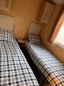 Ein Bett oder Betten in einem Zimmer der Unterkunft Bungalow WILLERBY