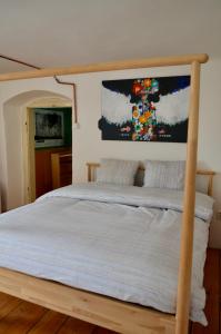 Postel nebo postele na pokoji v ubytování Karlštejn 34