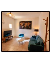 Prostor za sedenje u objektu Appartement Roussillon