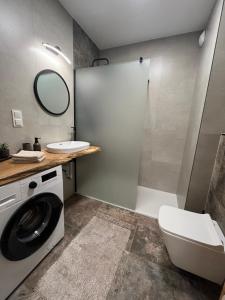 Ένα μπάνιο στο Apartament Tatarska 4B