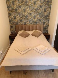 Ένα ή περισσότερα κρεβάτια σε δωμάτιο στο Apartament Tatarska 4B