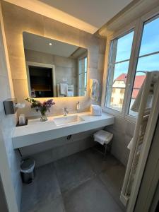 Et badeværelse på Hotel Au Nid De Cigognes