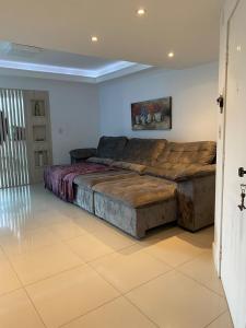 Posezení v ubytování Apartamento Espaçoso