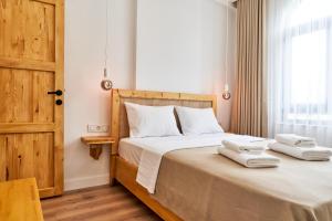 Postel nebo postele na pokoji v ubytování Audo Local