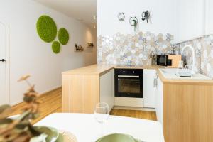 a kitchen with a sink and a counter top at Bubbly Apartment in Bled