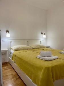 Ένα ή περισσότερα κρεβάτια σε δωμάτιο στο Olive place 2