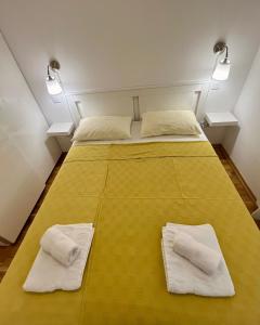 Ένα ή περισσότερα κρεβάτια σε δωμάτιο στο Olive place 2