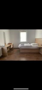 Ein Bett oder Betten in einem Zimmer der Unterkunft Tacidur Home
