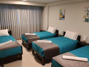 Voodi või voodid majutusasutuse Vianca Hotel toas