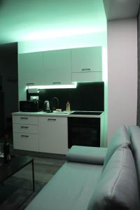 Postel nebo postele na pokoji v ubytování Apartman Callosum