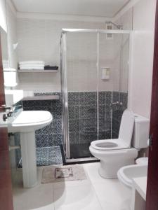 Ένα μπάνιο στο Ferienwohnung für 3 Personen 1 Kind ca 52 qm in Adeje, Teneriffa Westküste von Teneriffa