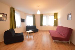 Posezení v ubytování Toldi Apartments Pécs