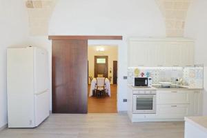 Kuchyň nebo kuchyňský kout v ubytování villa dei cento Pini