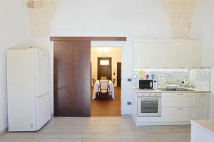Kuchyň nebo kuchyňský kout v ubytování villa dei cento Pini