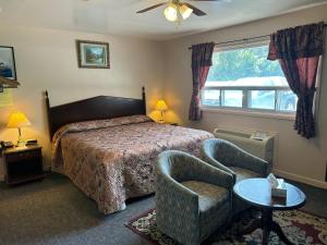 Ένα ή περισσότερα κρεβάτια σε δωμάτιο στο The Silver Birch Motel