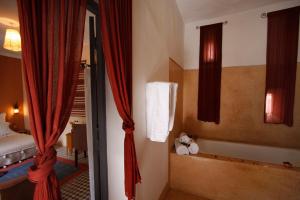 Letto o letti in una camera di Dar Touyir
