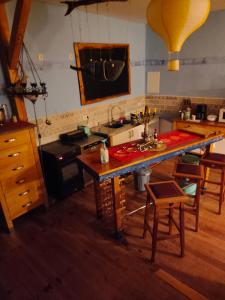 a kitchen with a counter top and a sink at Gutshaus im Grünen in Poseritz