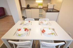 Kuchyň nebo kuchyňský kout v ubytování Toldi Apartments Pécs