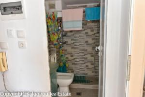 Koupelna v ubytování New Apartment Nea Kalikratia Chalkidiki near beach + 17 fotografií
