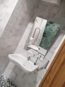 Ένα μπάνιο στο Apartamentos La Casa De Allá 1