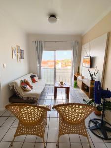 a living room with a couch and chairs at Apartamento amplo perto da Praia da Litorânea - Carmona Temporadas in São Luís +22 photos