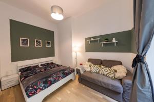 Un pat sau paturi într-o cameră la Wenceslas square apartment