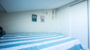 Posteľ alebo postele v izbe v ubytovaní Estudio con piscina en A Guarda- Pontevedra