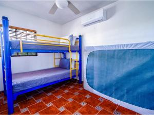 a room with two bunk beds on a bus at Casa Barquito - Pool house in San Felipe in San Felipe +40 photos