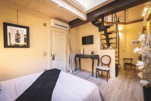 Posteľ alebo postele v izbe v ubytovaní B&B Il Sogno del Pinzagrilli