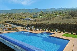 a swimming pool with a view of a mountain at Ferienhaus mit Privatpool für 7 Personen ca 130 qm in Tijarafe, La Palma Westküste von La Palma in Tijarafe