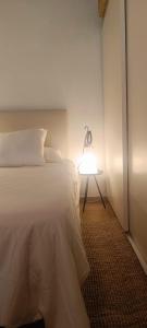 Ein Bett oder Betten in einem Zimmer der Unterkunft Tortona Design Navigli Milan