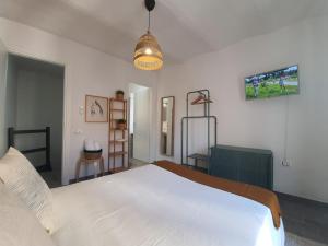 Postel nebo postele na pokoji v ubytování CASA DINA - Fondi Vertice Rooms