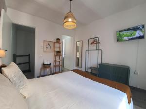 Postel nebo postele na pokoji v ubytování CASA DINA - Fondi Vertice Rooms