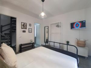 Postel nebo postele na pokoji v ubytování CASA DINA - Fondi Vertice Rooms
