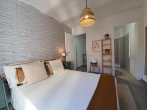Postel nebo postele na pokoji v ubytování CASA DINA - Fondi Vertice Rooms