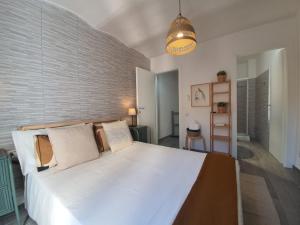 Postel nebo postele na pokoji v ubytování CASA DINA - Fondi Vertice Rooms