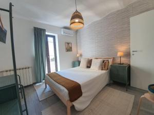 Postel nebo postele na pokoji v ubytování CASA DINA - Fondi Vertice Rooms
